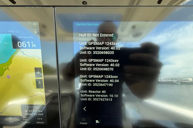 Slide: The Image of Garmin device screen on 2009 Everglades 350LX boat displaying GPS and software details. - 36