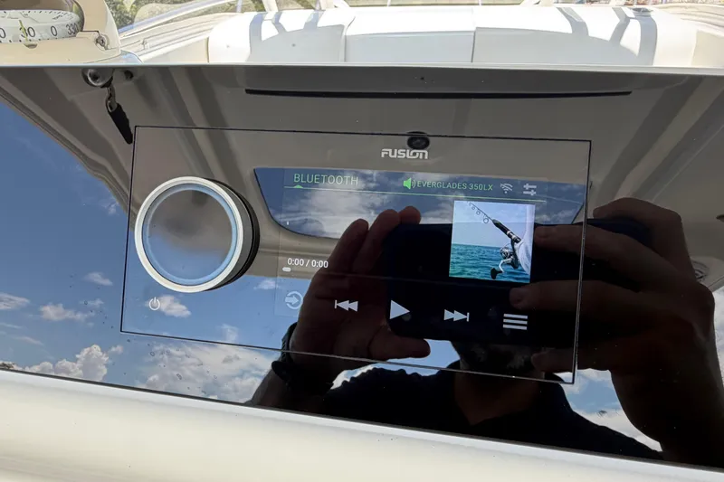 Slide: The Image of Fusion audio system on 2009 Everglades 350LX boat, displaying Bluetooth connectivity. - 62
