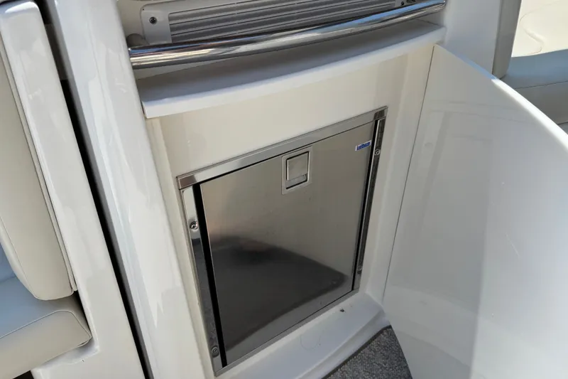 Slide: The Image of Stainless steel cabinet on 2009 Chaparral Signature 330 boat interior. - 22