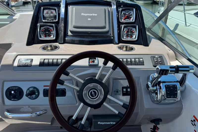 Slide: The Image of Steering console of 2009 Chaparral Signature 330 with Raymarine navigation system. - 13