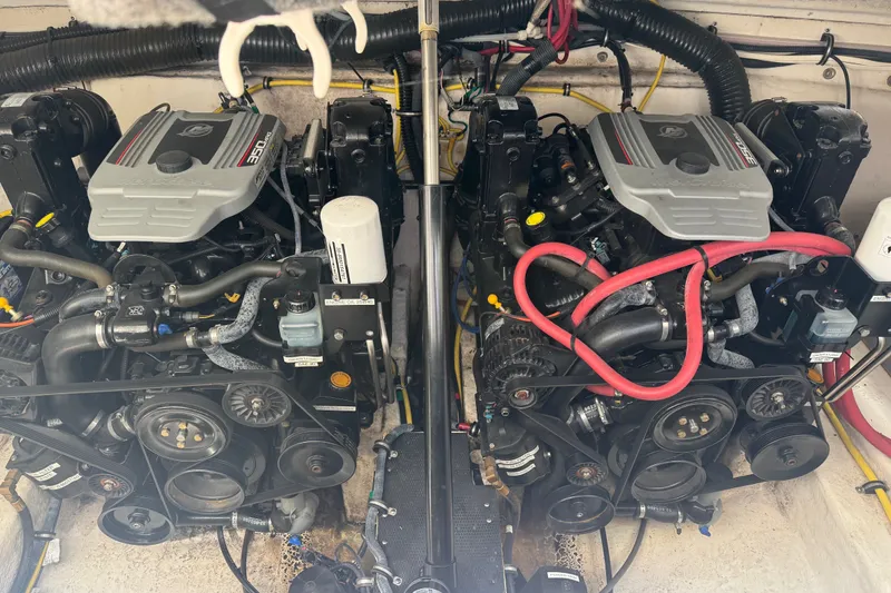 Slide: The Image of Engine compartment of a 2009 Chaparral Signature 330 boat, featuring dual 350 MAG engines. - 35
