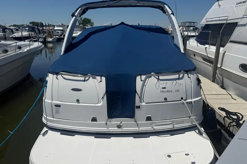 Slide: The Image of 2009 Chaparral Signature 330 boat docked with blue cover, Hinckley, OH. - 3