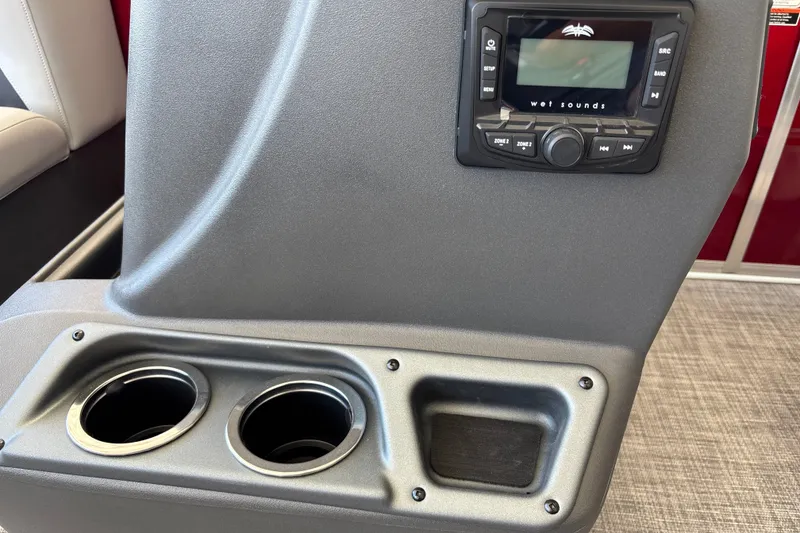 Slide: The Image of 2026 Sun Tracker Party Barge 16 DLX console with stereo and cup holders. - 13