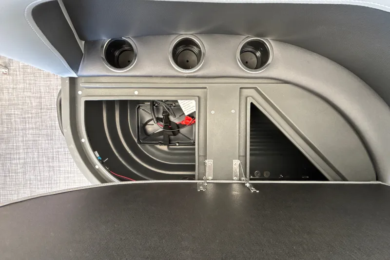 Slide: The Image of Interior view of 2026 Sun Tracker Party Barge 16 DLX storage compartment. - 22