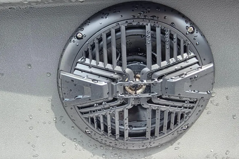 Slide: The Image of Water droplets on a speaker grill of a 2026 Sun Tracker Party Barge 20 DLX. - 12