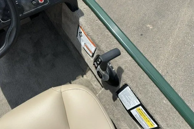 Slide: The Image of Interior view of 2026 Tracker Bass Tracker Classic Limited boat, featuring steering and control panel. - 17