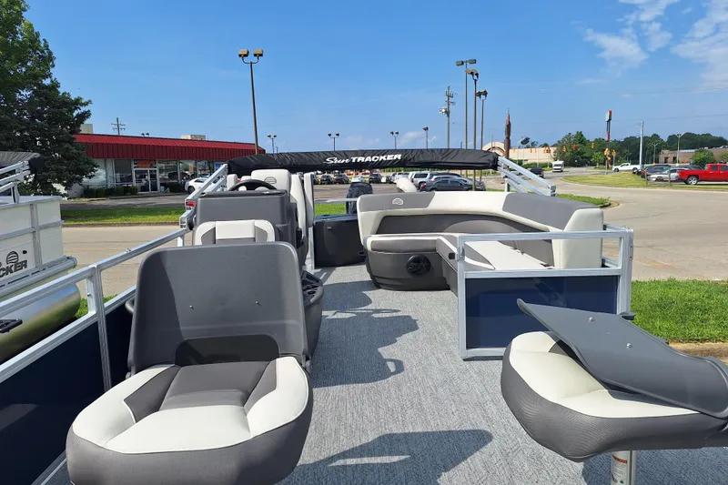 Slide: The Image of 2026 Sun Tracker Bass Buggy 18 DLX pontoon boat with spacious seating and modern design. - 8