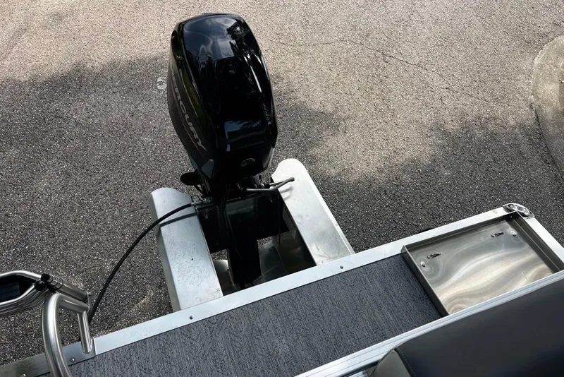 Slide: The Image of 2026 Sun Tracker Bass Buggy 16 XL Select with Mercury outboard motor. - 4
