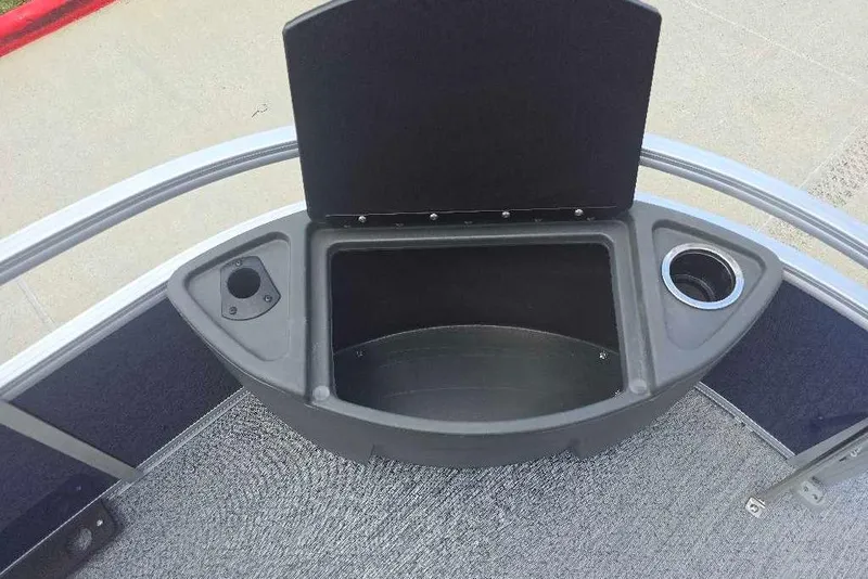 Slide: The Image of Storage compartment on 2026 Sun Tracker Bass Buggy 18 DLX pontoon boat with cup holders. - 10