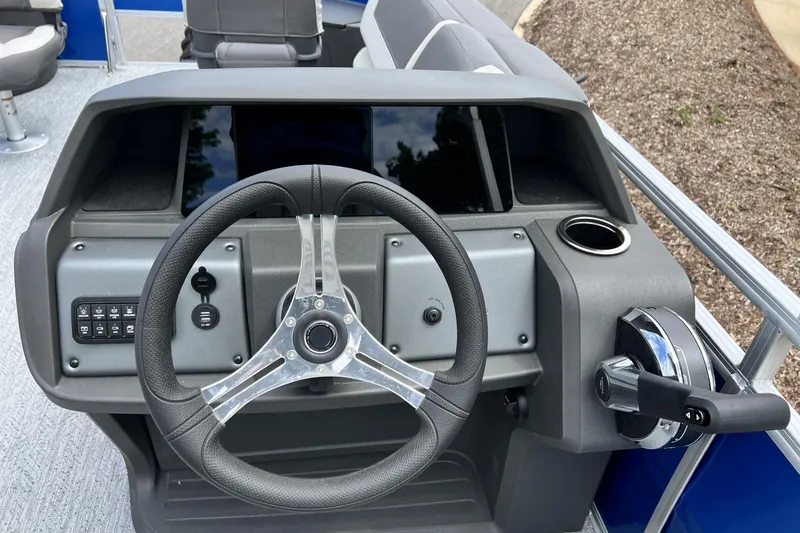 Slide: The Image of Steering console of 2026 Sun Tracker Fishin' Barge 20 DLX pontoon boat. - 3