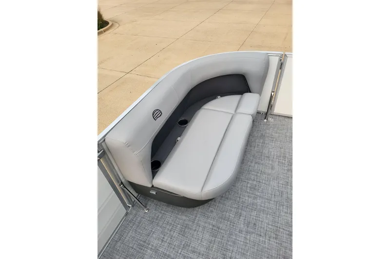 Slide: The Image of 2026 Sun Tracker Party Barge 16 DLX pontoon seating with gray upholstery and cup holders. - 6
