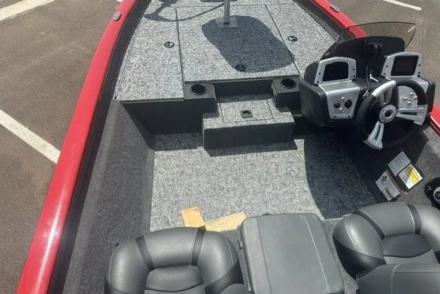Slide: The Image of 2026 Tracker Pro Team 175 boat interior with steering console and seating. - 17