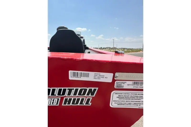 Slide: The Image of 2026 Tracker Pro Team 175 boat with red hull and labels. - 70