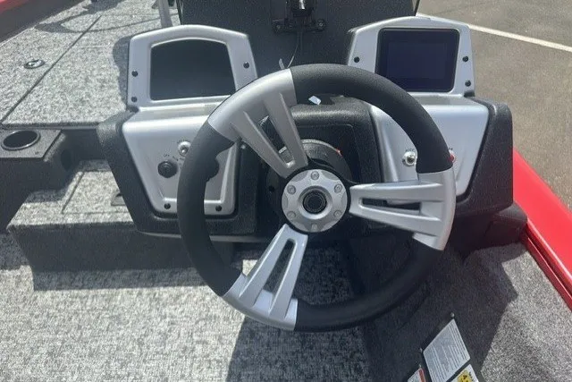 Slide: The Image of Steering wheel of 2026 Tracker Pro Team 175 boat with dual consoles. - 14