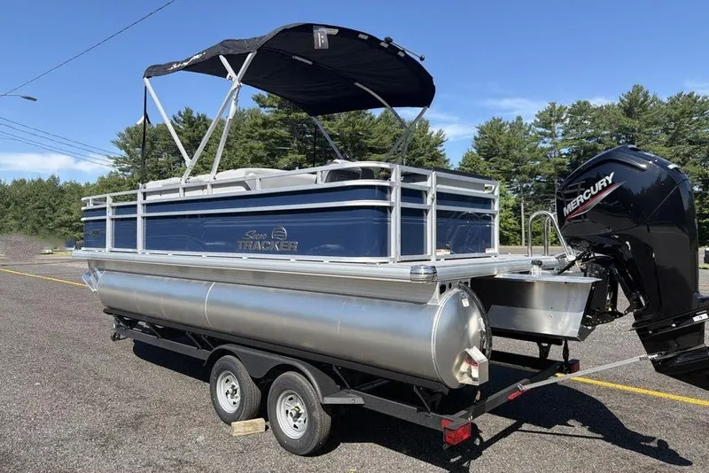 Slide: The Image of 2026 Sun Tracker SportFish 20 DLX pontoon boat with Mercury engine on trailer. - 4