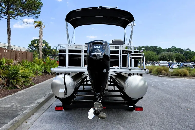Slide: The Image of 2026 Sun Tracker Fishin' Barge 20 DLX pontoon boat with Mercury outboard motor. - 4