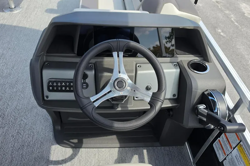 Slide: The Image of Steering console of 2026 Sun Tracker Fishin' Barge 20 DLX pontoon boat. - 14