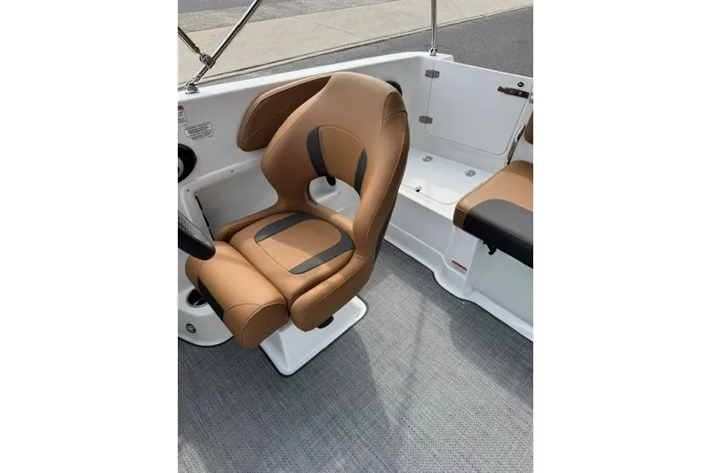 Slide: The Image of 2026 Tahoe 2150 boat interior with tan and black seating, modern design. - 13