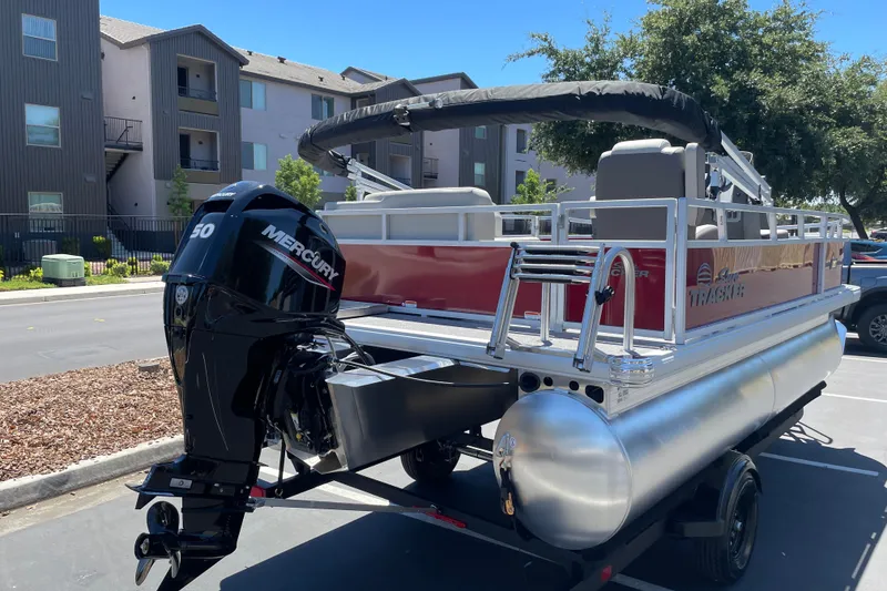 Slide: The Image of 2026 Sun Tracker Bass Buggy 16 XL Select pontoon boat with Mercury 50 engine. - 32