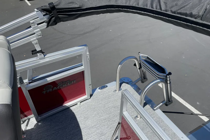Slide: The Image of 2026 Sun Tracker Bass Buggy 16 XL Select boat interior with ladder and gate. - 25