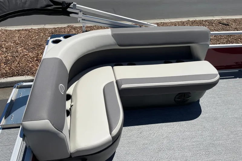Slide: The Image of 2026 Sun Tracker Bass Buggy 16 XL Select boat seating with cup holders. - 23