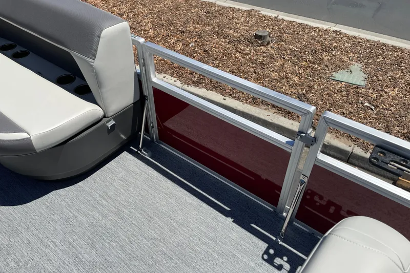 Slide: The Image of 2026 Sun Tracker Bass Buggy 16 XL Select pontoon boat interior with seating and railing. - 27
