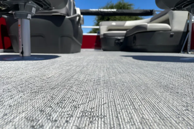 Slide: The Image of 2026 Sun Tracker Bass Buggy 16 XL Select interior with textured flooring and seating. - 29