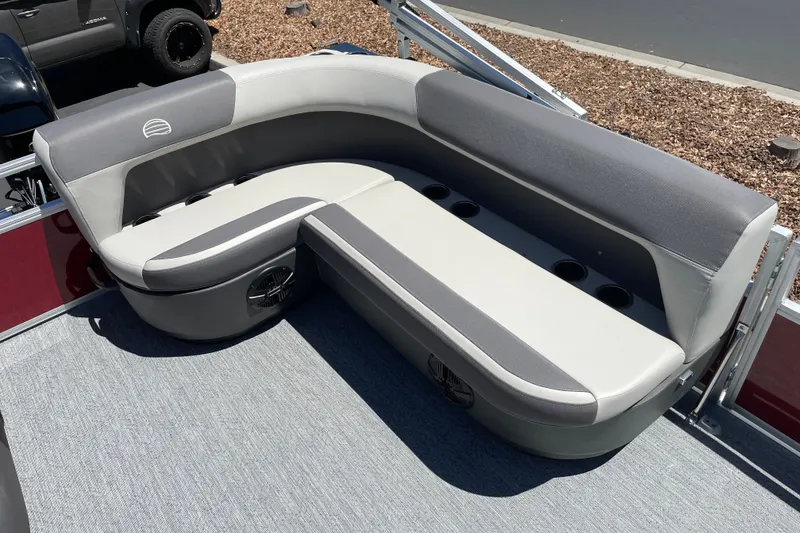 Slide: The Image of 2026 Sun Tracker Bass Buggy 16 XL Select boat seating with cup holders and speaker. - 14