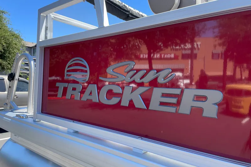 Slide: The Image of 2026 Sun Tracker Bass Buggy 16 XL Select boat logo in bright sunlight. - 31