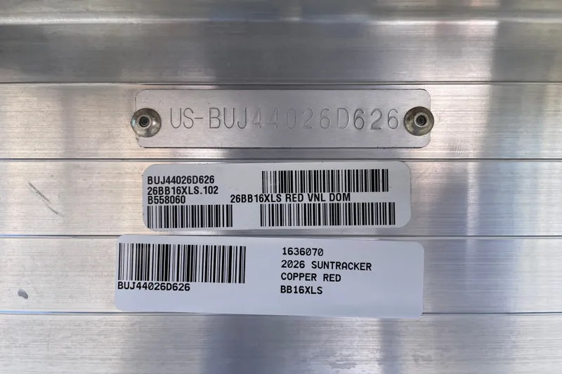 Slide: The Image of 2026 Sun Tracker Bass Buggy 16 XL Select identification plate with serial numbers and barcodes. - 108