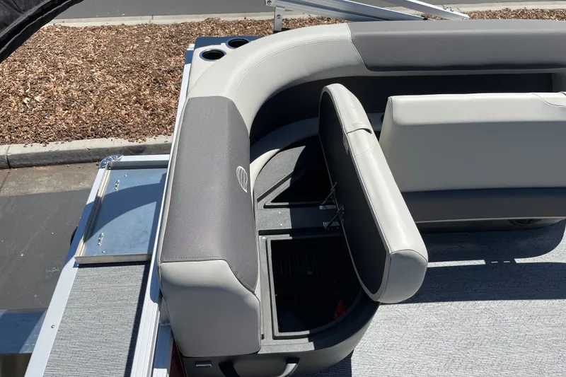 Slide: The Image of 2026 Sun Tracker Bass Buggy 16 XL Select boat interior with open storage compartment. - 22