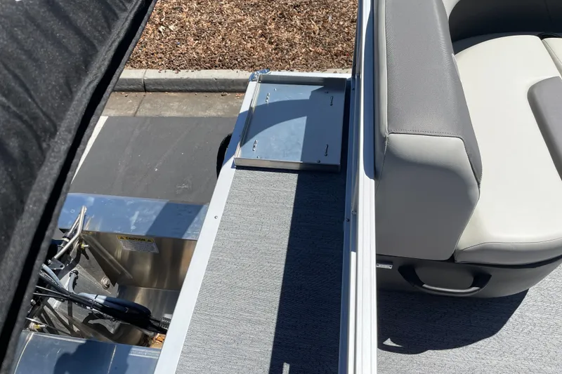 Slide: The Image of 2026 Sun Tracker Bass Buggy 16 XL Select pontoon boat interior with seating and deck details. - 24
