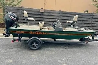 The Image of 2026 Tracker Bass Tracker Classic Limited boat on trailer, parked outdoors. - 0