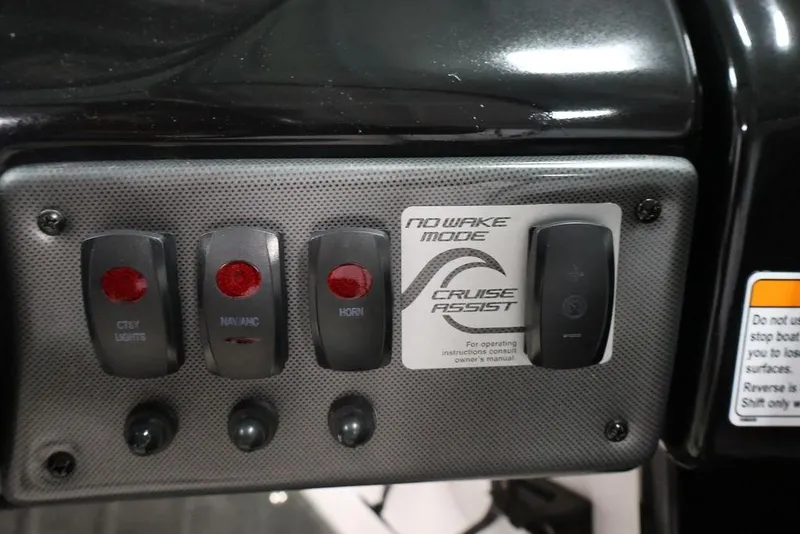 Slide: The Image of Control panel of a 2016 Yamaha Boats SX192 featuring switches and cruise assist. - 20