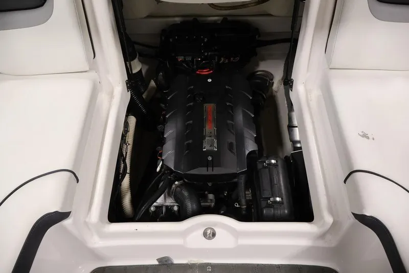 Slide: The Image of 2016 Yamaha Boats SX192 engine compartment, showcasing a clean and well-maintained motor. - 34