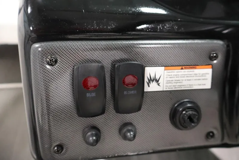 Slide: The Image of Control panel of a 2016 Yamaha Boats SX192 with bilge and blower switches. - 35