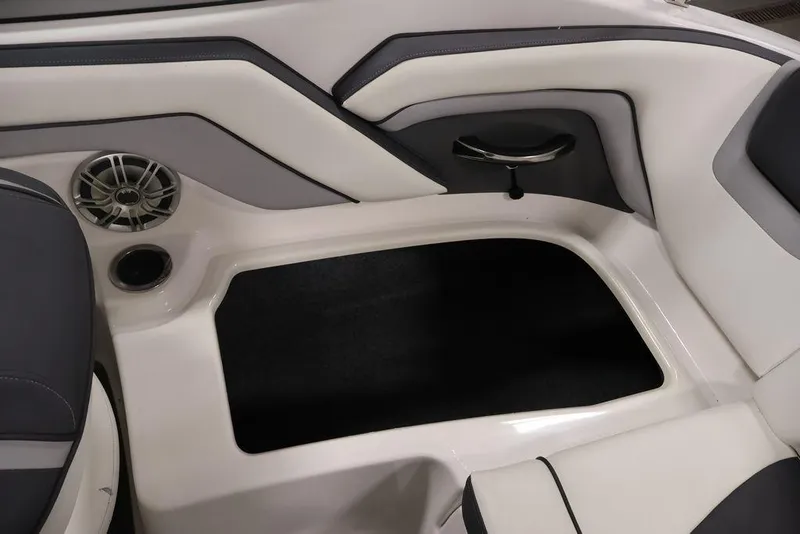 Slide: The Image of 2016 Yamaha Boats SX192 interior seating with speaker and cup holder. - 36