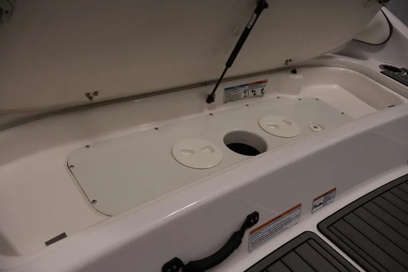 Slide: The Image of Open storage compartment on a 2016 Yamaha Boats SX192. - 41