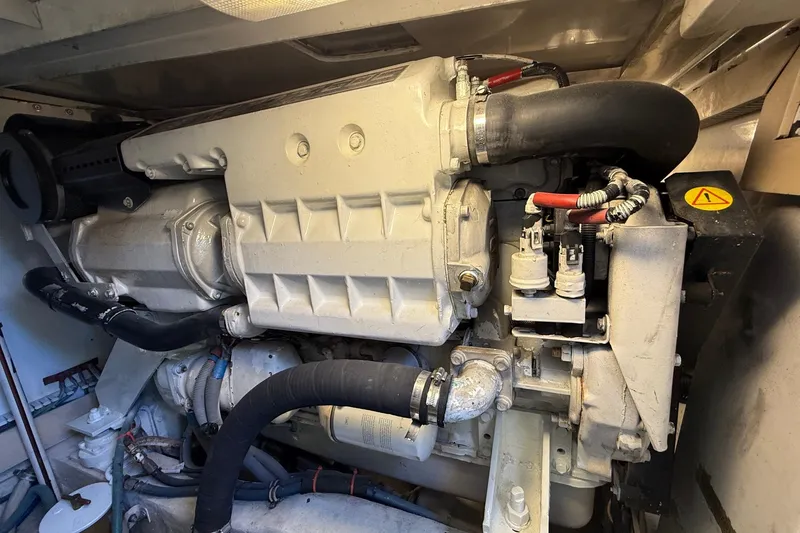 Slide: The Image of Engine compartment of a 2002 Bertram 390 Convertible boat. - 28