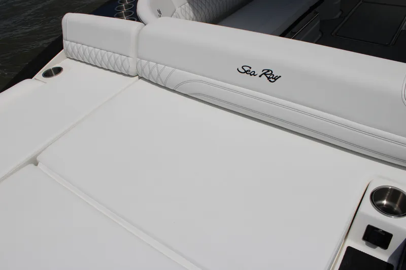 Slide: The Image of The image shows the white upholstery of a 2026 Sea Ray SLX 280 Outboard. - 47