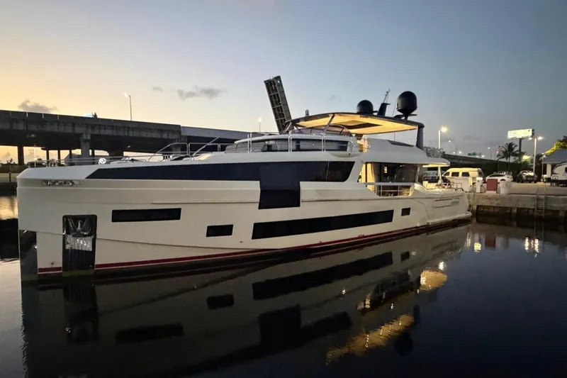 Slide: The Image of Luxury Sirena 88 yacht docked at sunset, 2024 model. - 64