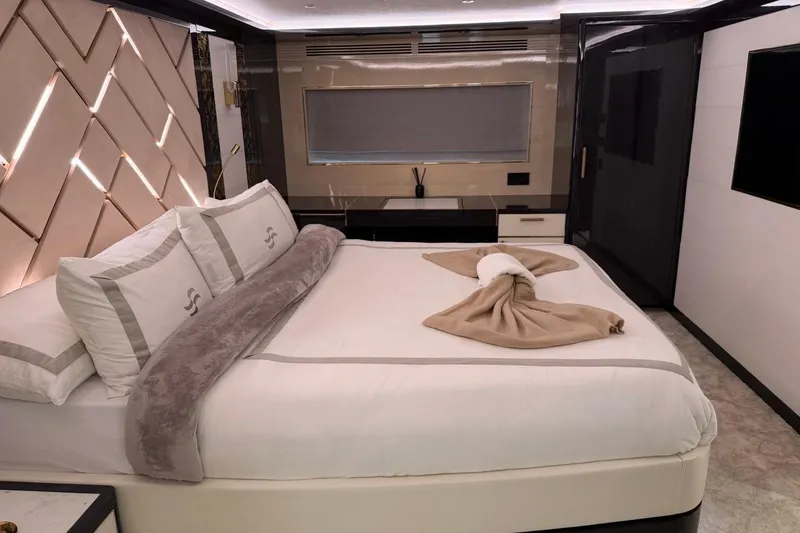 Slide: The Image of Luxurious bedroom interior of 2024 Sirena 88 yacht with elegant bedding and modern design. - 78