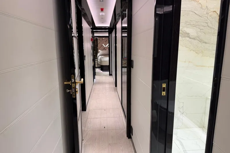 Slide: The Image of Luxurious interior hallway of 2024 Sirena 88 yacht, featuring elegant design and modern finishes. - 118