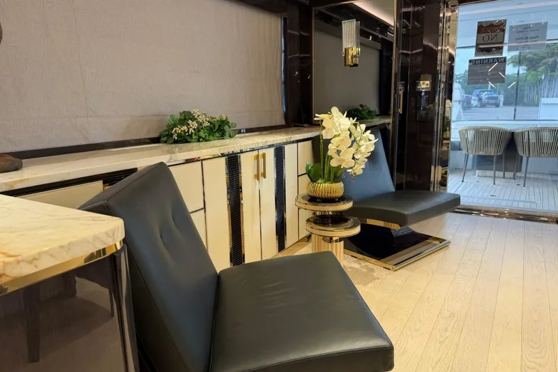 Slide: The Image of Luxurious interior of 2024 Sirena 88 yacht with elegant seating and floral decor. - 115