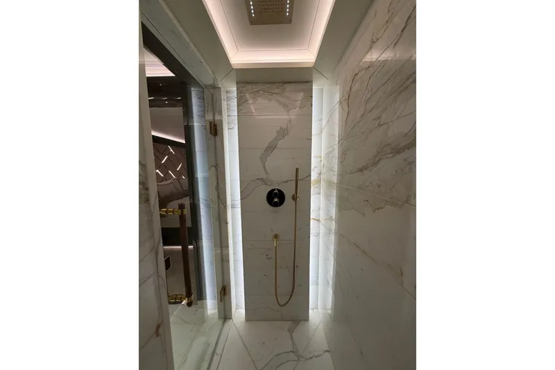 Slide: The Image of Luxurious marble shower interior in 2024 Sirena 88 yacht. - 76