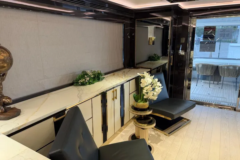 Slide: The Image of Luxurious interior of 2024 Sirena 88 yacht with elegant seating and decor. - 114