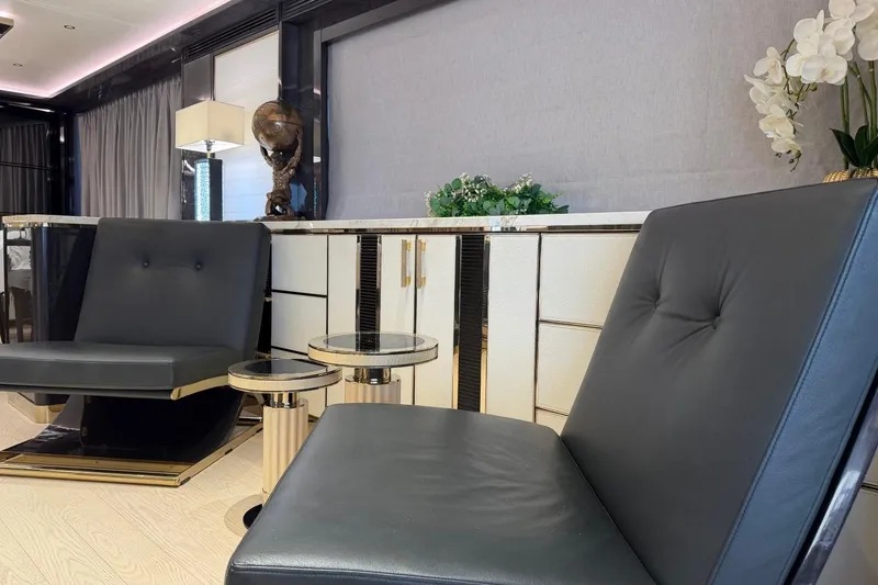 Slide: The Image of Luxurious interior of 2024 Sirena 88 yacht with elegant seating and decor. - 106