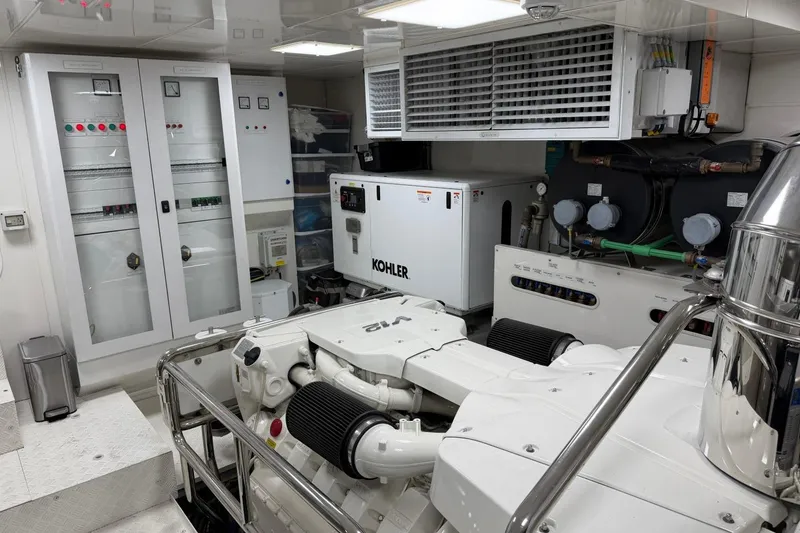 Slide: The Image of Engine room of 2024 Sirena 88 yacht with Kohler generator and control panels. - 148