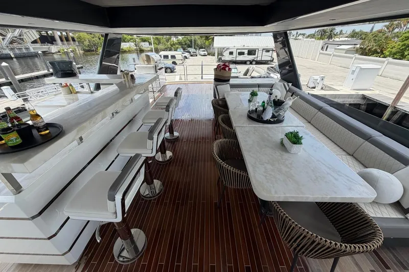 Slide: The Image of Luxurious 2024 Sirena 88 yacht interior with elegant bar and dining area. - 48