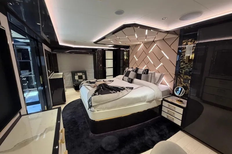 Slide: The Image of Luxurious 2024 Sirena 88 yacht bedroom with modern design and elegant lighting. - 131